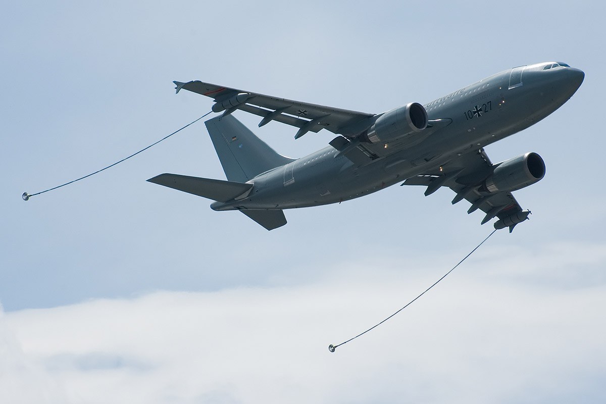 Luftwaffe A310 MRTT flying with hose-and-drogue refueling lines deployed.