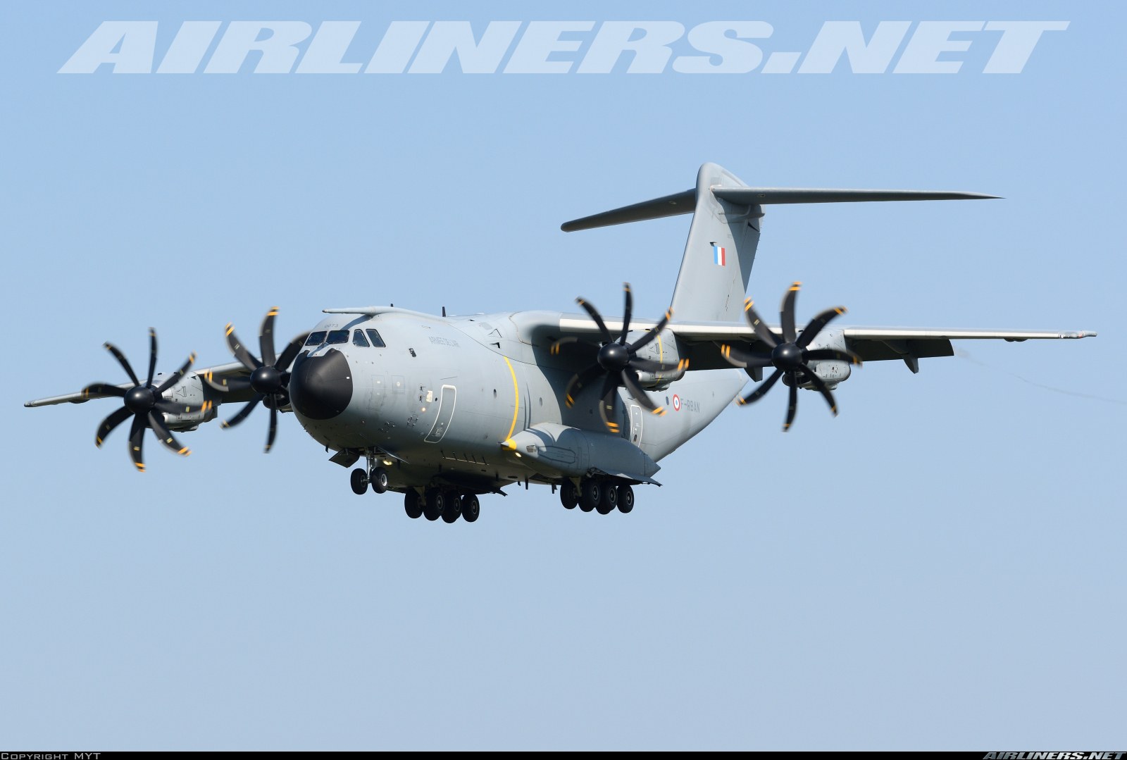 French-marked Airbus A400M Atlas approaching with landing gear extended.