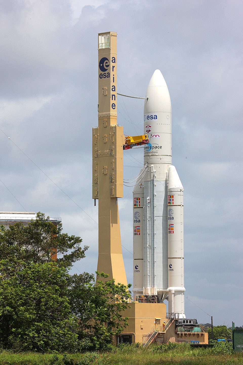 Ariane 5 launch vehicle standing vertically on the launch pad, showing the European heavy-lift rocket associated with Airbus space activity.