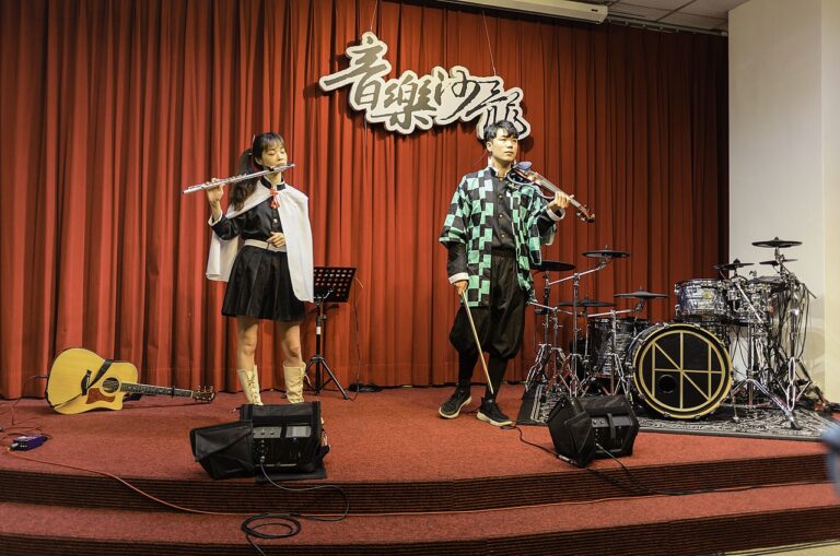 Lily Boy and musical instruments on the stage