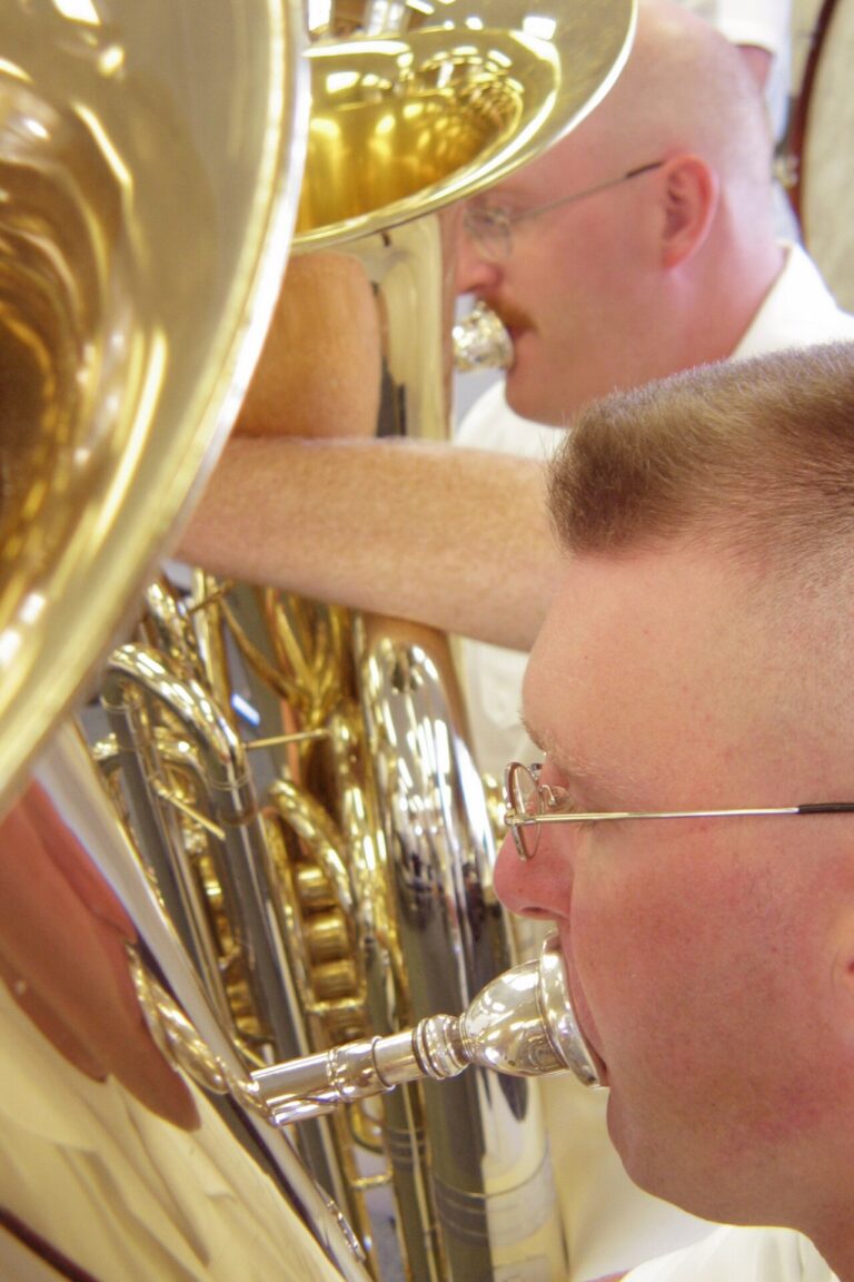US Navy 030627-N-3228 G-001 Pacific Fleet Band (PACFLT) musicians practice at an "all hands" rehearsal before performing at