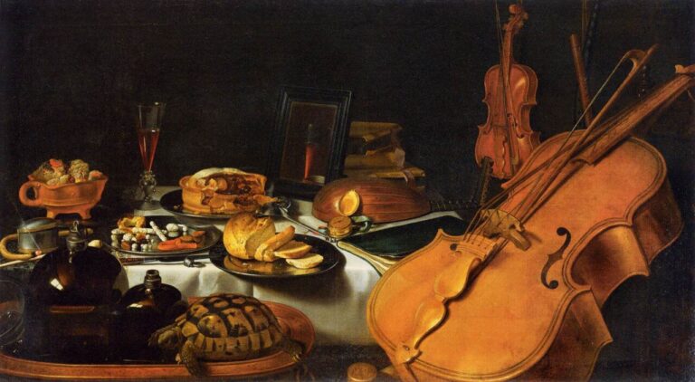 Still life with musical instruments on a laid table