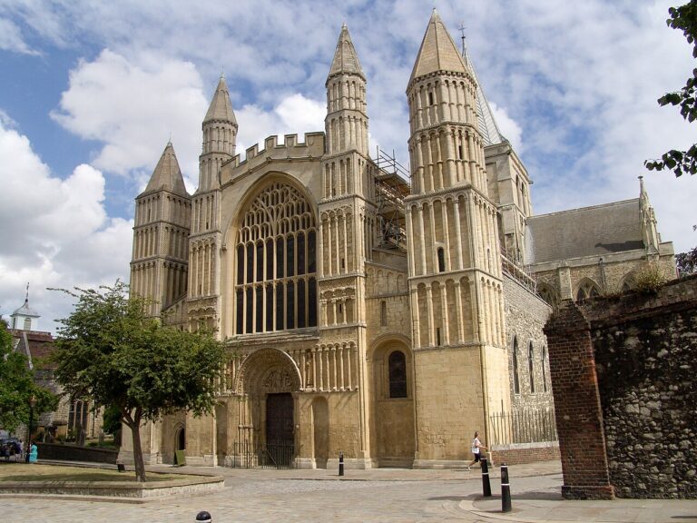 West facade of Rochester Cathedral showing Norman Romanesque architecture with twin towers and great west window Rochester Kent