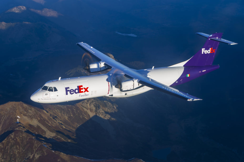 FedEx ATR 72-600F freighter flying with both turboprop engines visible.