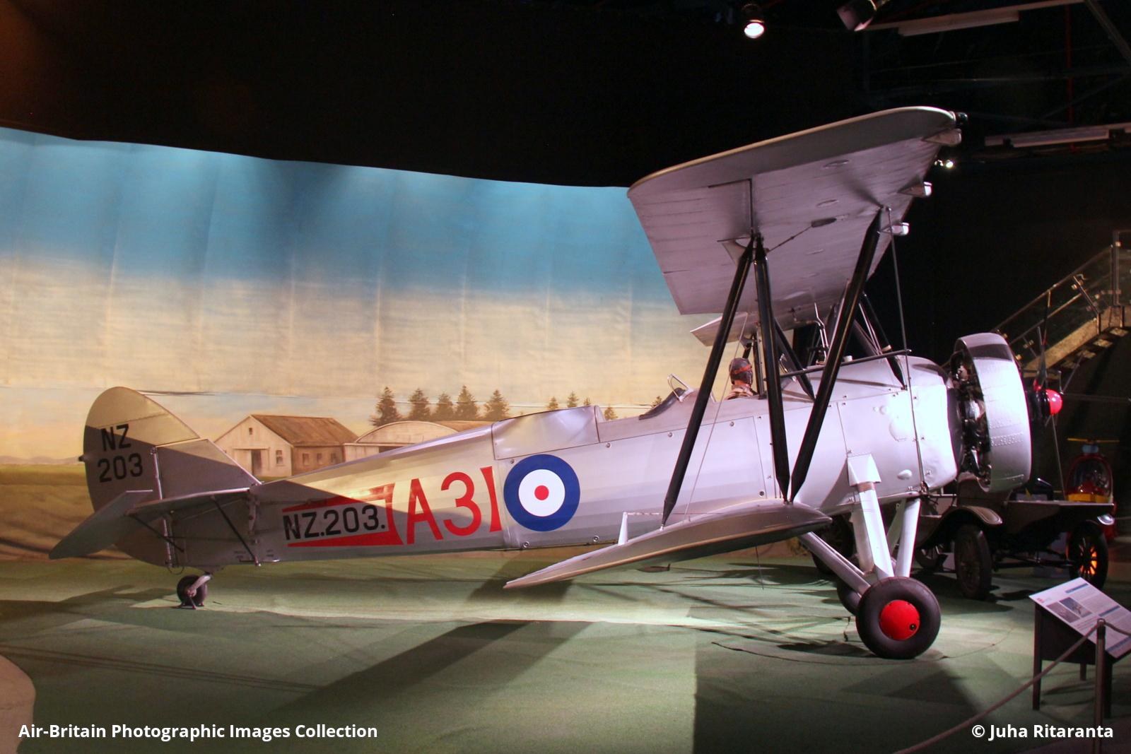 Silver Avro 626 Prefect NZ203 displayed indoors with A3 markings.