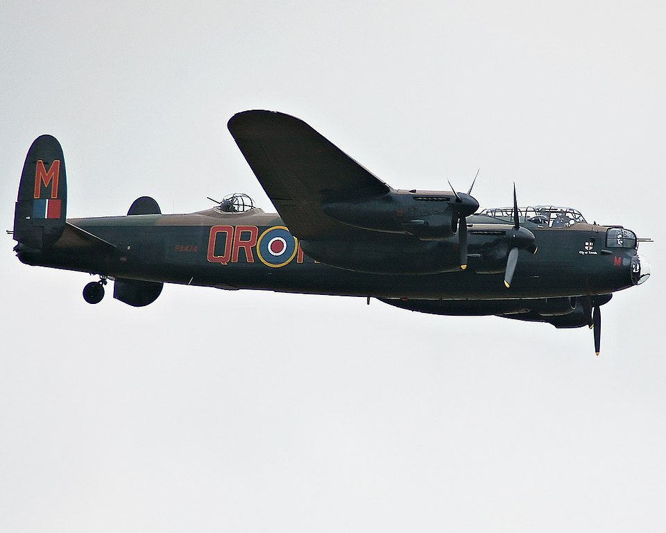 Avro Lancaster PA474 in flight, showing the four-engine heavy bomber that anchors Avro's wartime aircraft record.