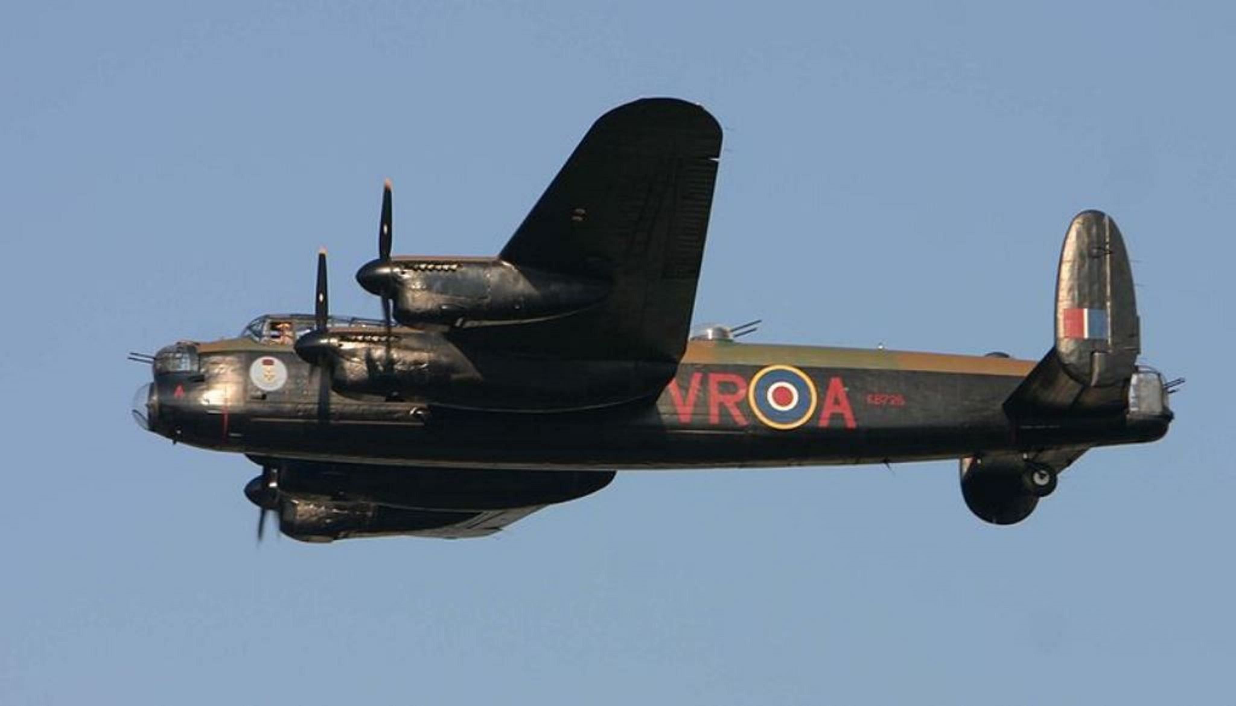 Close view of an Avro Lancaster tail and rear fuselage in flight.