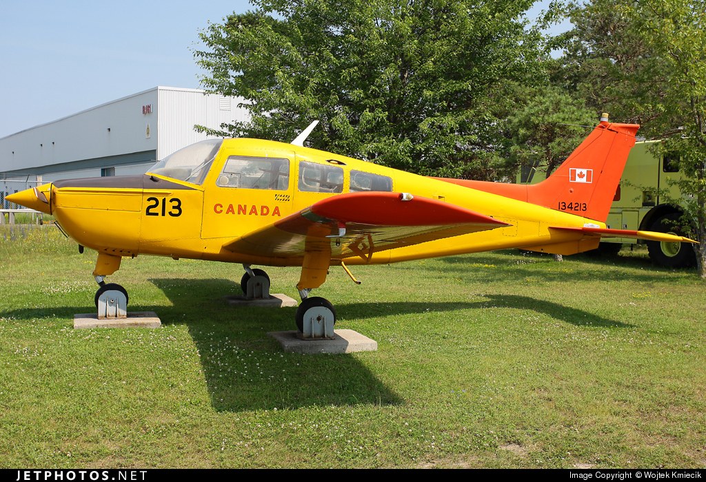 Beechcraft CT-134 Musketeer 134213 parked on grass with Canadian markings.