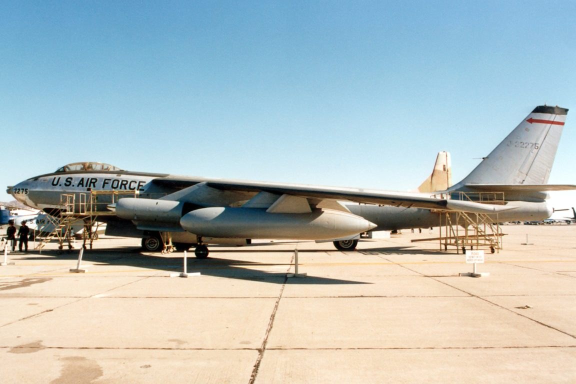U.S. Air Force Boeing B-47 2275 parked on a ramp with stairs and barriers.