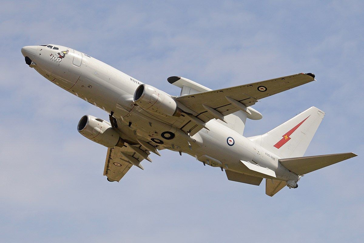 Royal Australian Air Force Boeing E-7 A30-006 climbing with underside and radar fairing visible.