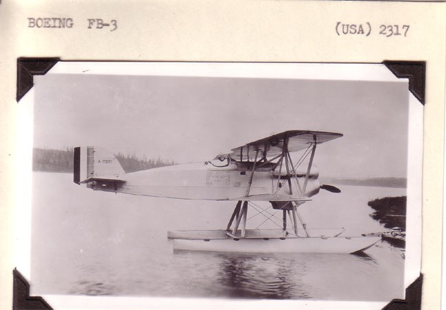 Boeing FB-3 biplane fitted with twin floats on water.