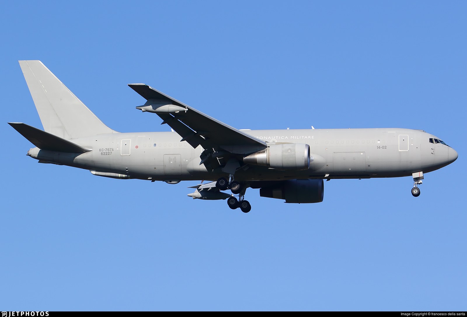 Italian Air Force KC-767A 14-02 flying with landing gear extended.