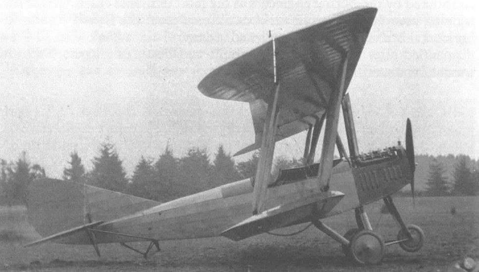 Boeing Model EA biplane photographed from the left side on a field.