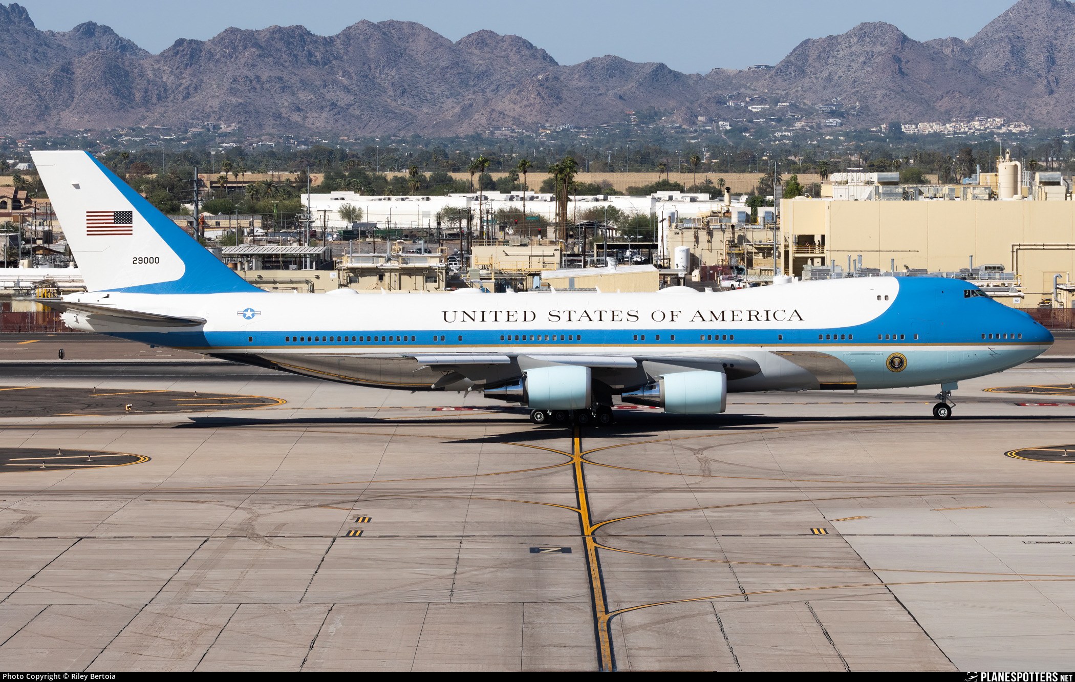 Boeing VC-25 29000 in side profile on an airport taxiway.