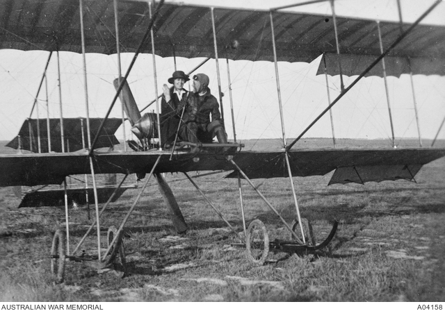 Bristol Boxkite - Babby Bridges sitting with the pilot of a Bristol Boxkite aircraft. See