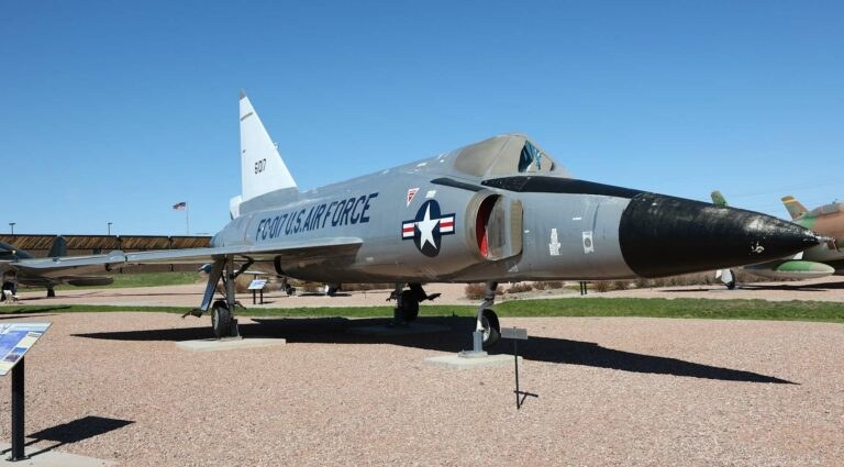 Convair F-102 Delta Dagger FC-017 displayed outdoors on gravel.