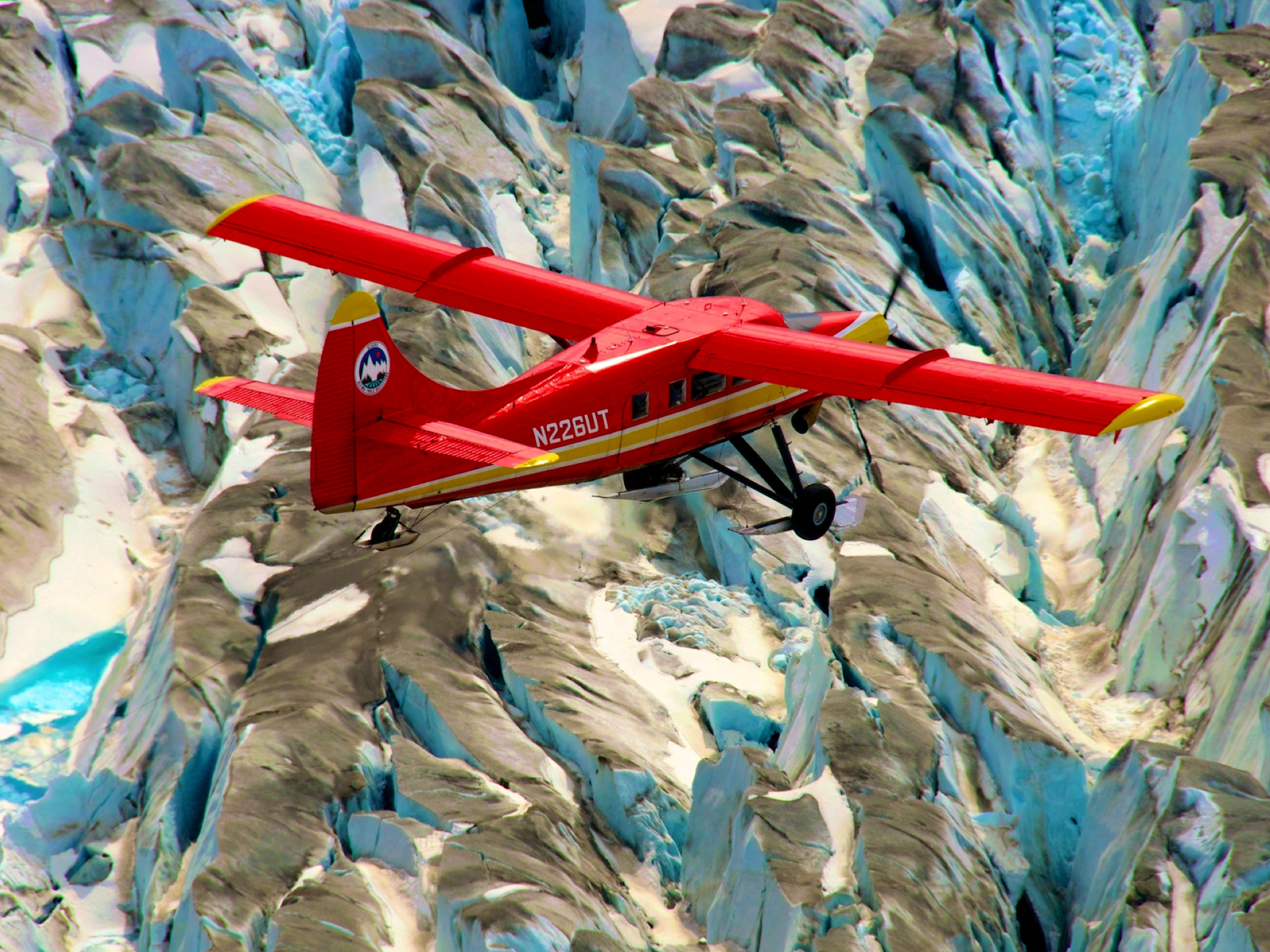 De Havilland Canada DHC-3 Otter flying over Arctic terrain