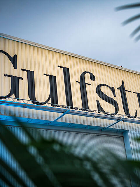 Close view of Gulfstream lettering on a building exterior