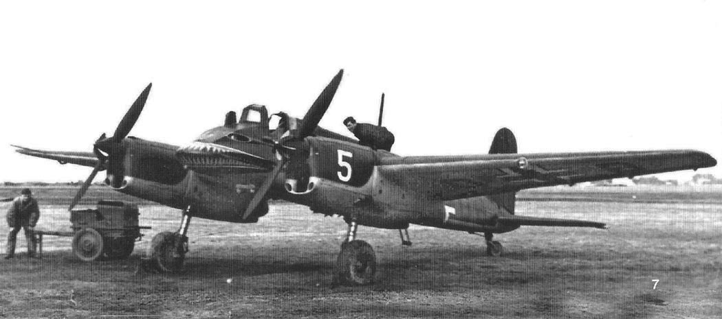 Henschel Hs 129 parked aircraft with ground crew nearby