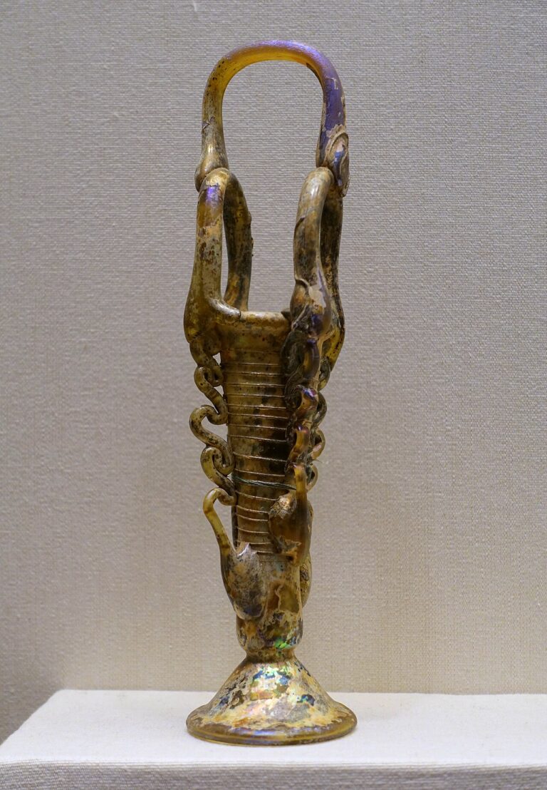 Basket handled unguentarium, Eastern Mediterranean, 4th 5th century AD, free blown glass with trailed and applied elements California Palace of the Legion of Honor San Francisco, CA