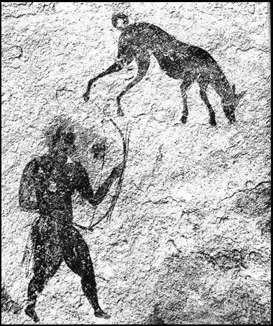 Hunting scene with dogs. Found in Hill station at Sefar, Tassili n Ajjer, Algeria. Dated c. 3, BCE