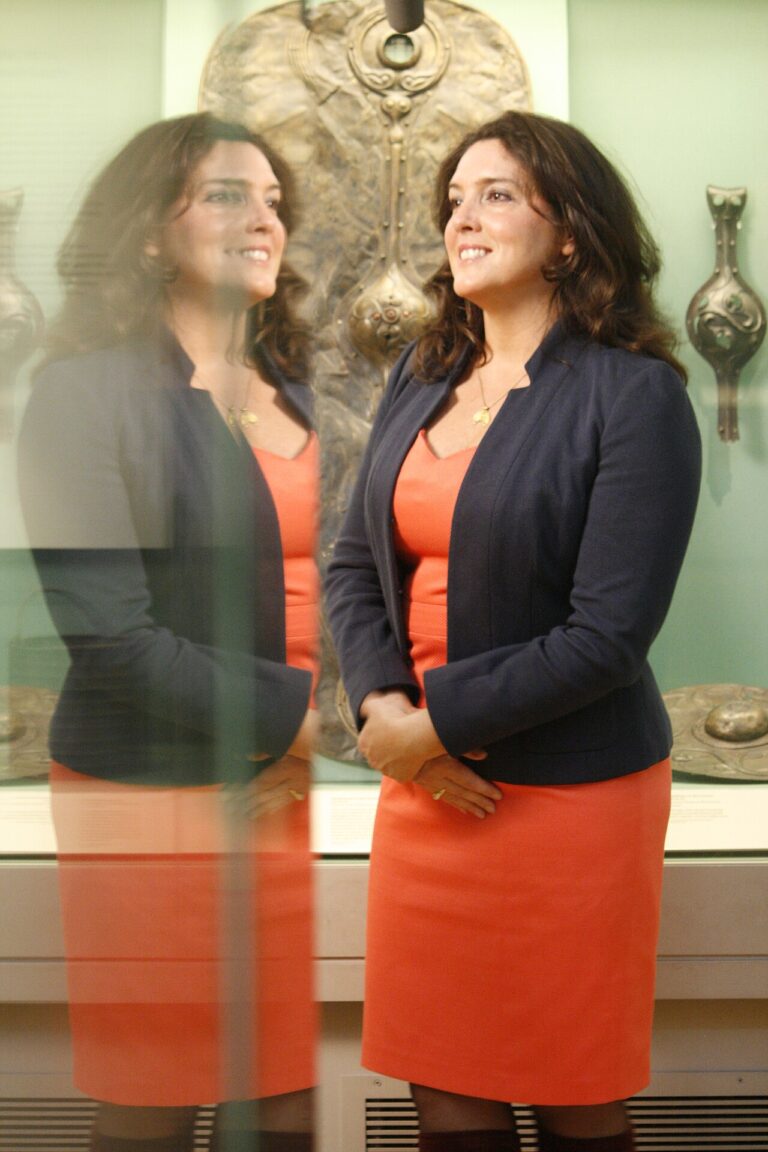 Bettany Hughes getting ready for a shot in front of the Battersea Shield