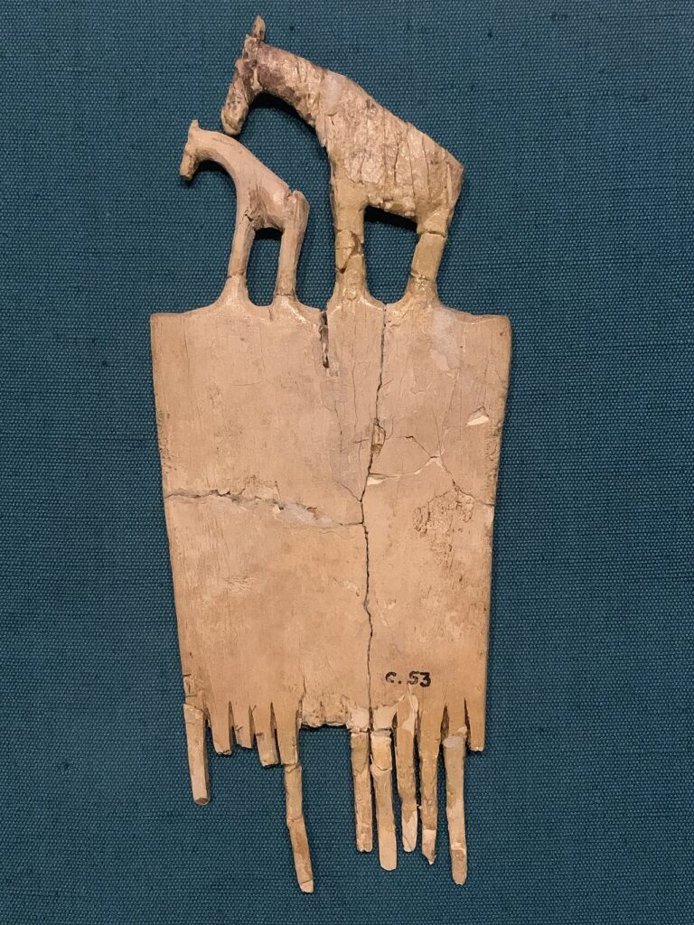 Comb decorated with a giraffe and its baby Neolithic Nubian Museum