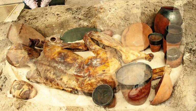 Typical Egyptian grave with naturally preserved body and grave goods