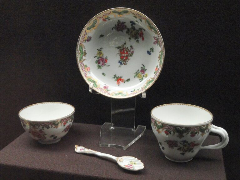 Armorial teacup, coffee cup, spoon and saucer from the Daniel Ludlow service, c., Bristol China Manufactory, hard paste porcelain, overglaze enamels, gilding Gardiner Museum, Toronto