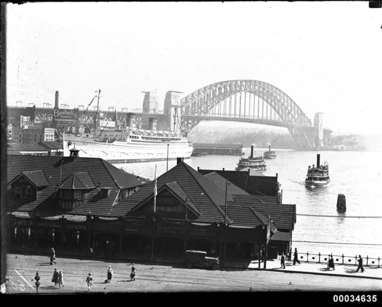 Nearly completed Sydney Harbour Bridge with SS MARIPOSA, February
