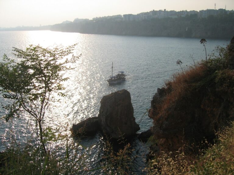 Boat below the Antalya cliffs