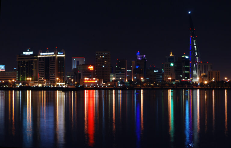 Manama skyline reflected in the water