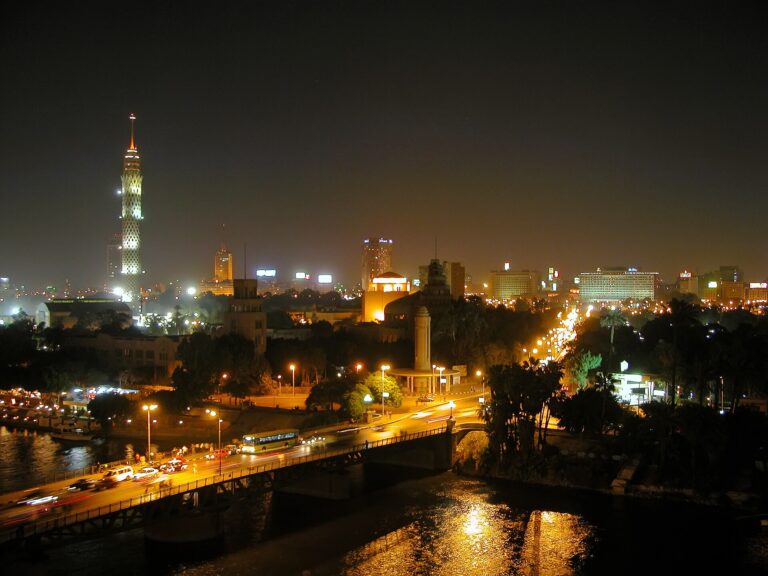 Cairo skyline and Nile traffic at night