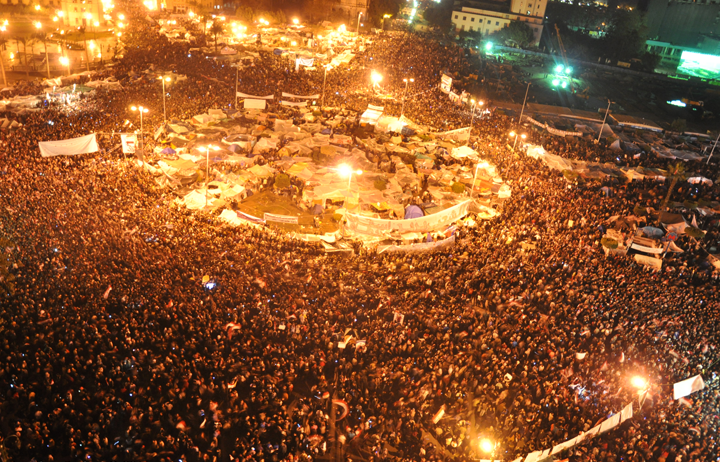 Crowds filling Tahrir Square at night