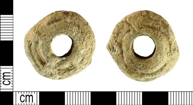 High Medieval lead alloy spindle whorl