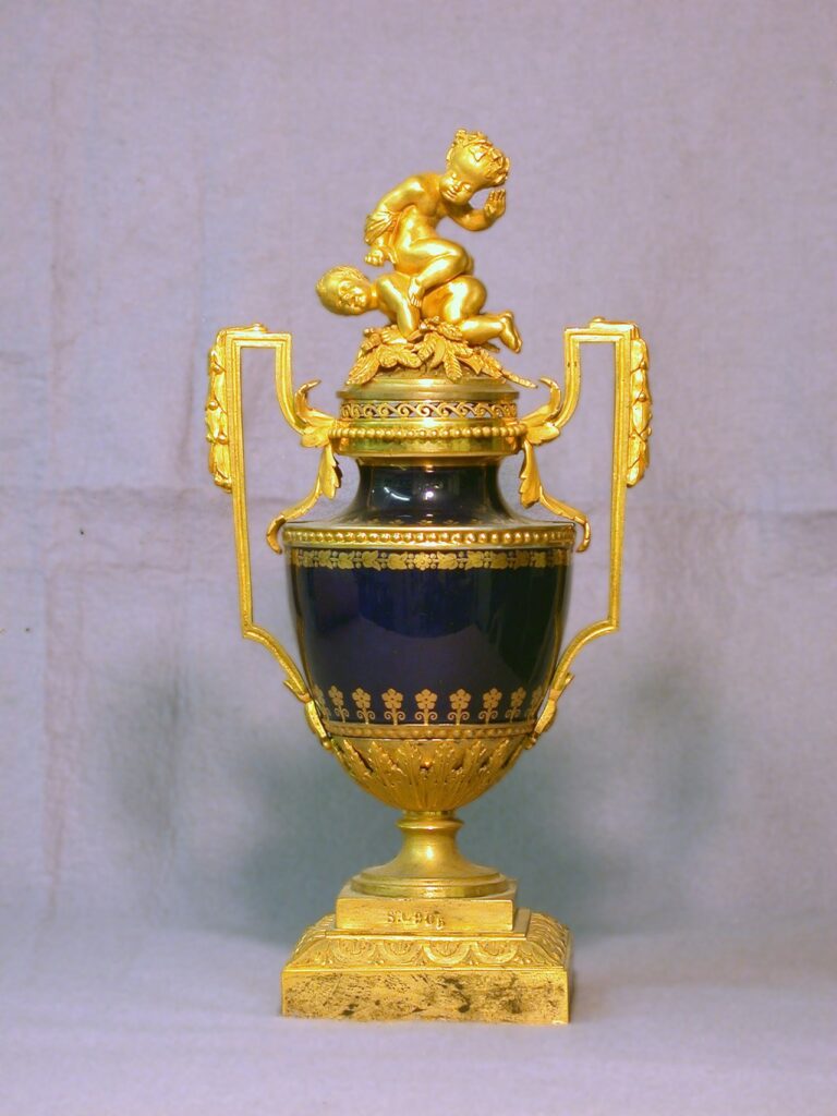 Urn with Ormolu Mounts and Two Putti