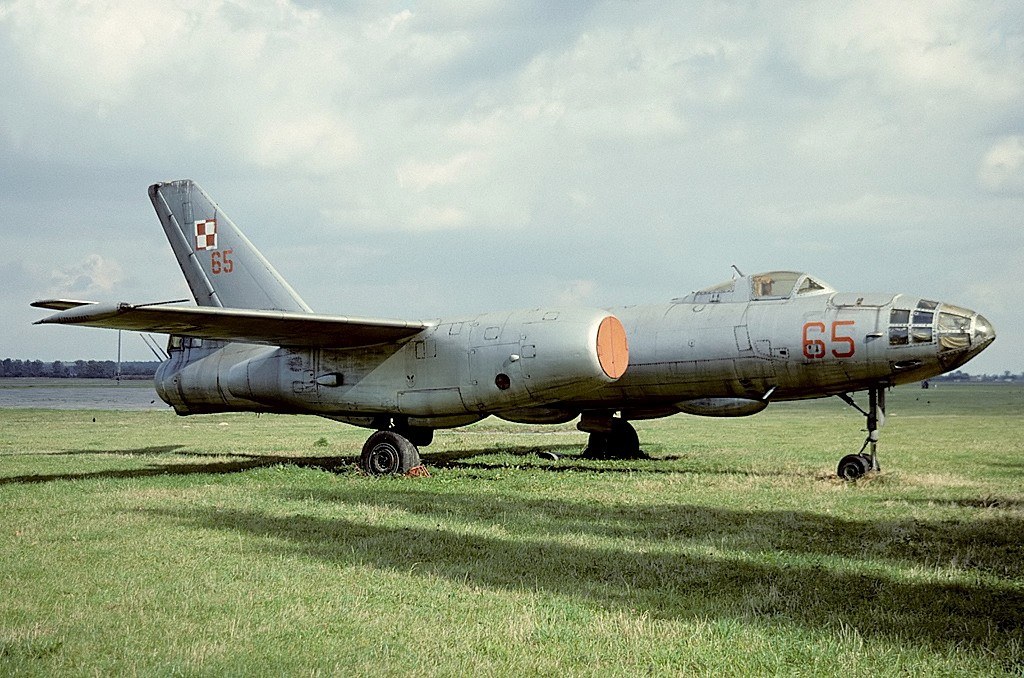 Side view of grey Ilyushin Il-28 number 65 with Polish checkerboard tail marking.