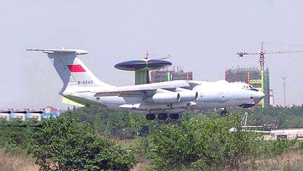 KJ-2000 airborne early warning aircraft departing near an urban airfield