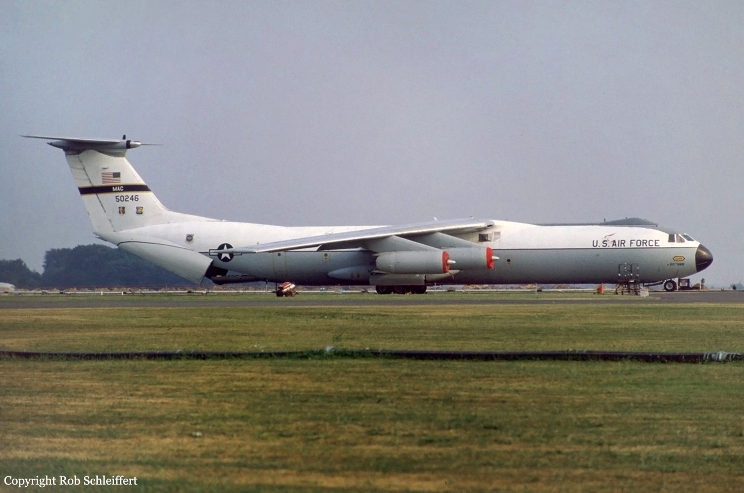 U.S. Air Force C-141 Starlifter MAC 50246 parked side-on with intake covers.