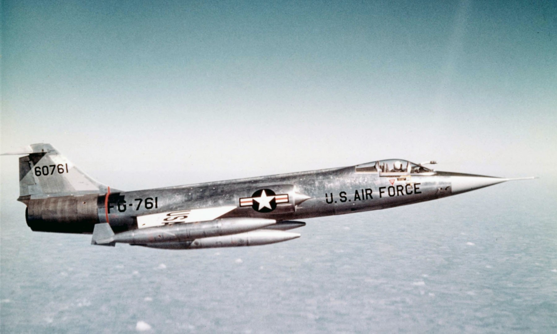 U.S. Air Force F-104 Starfighter 60761 flying side-on.