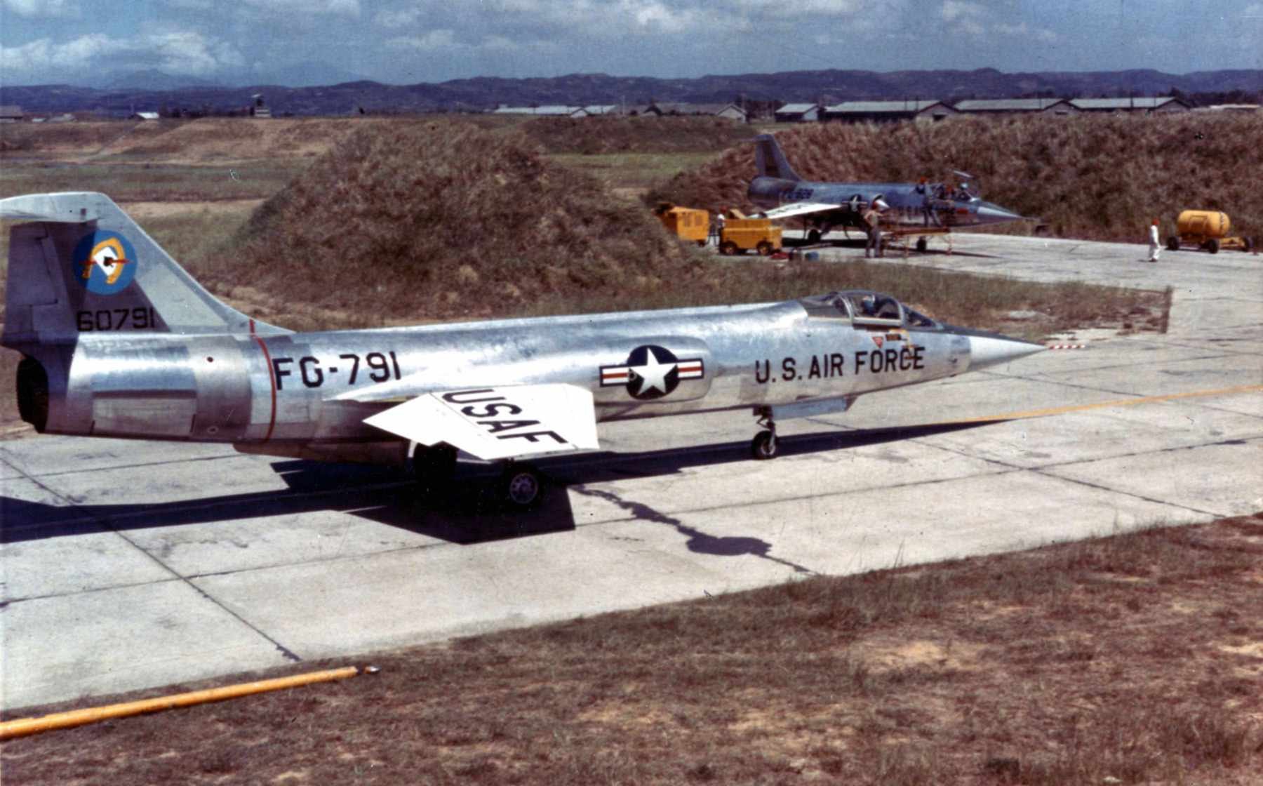 U.S. Air Force F-104 Starfighter FG-791 parked on a concrete ramp.