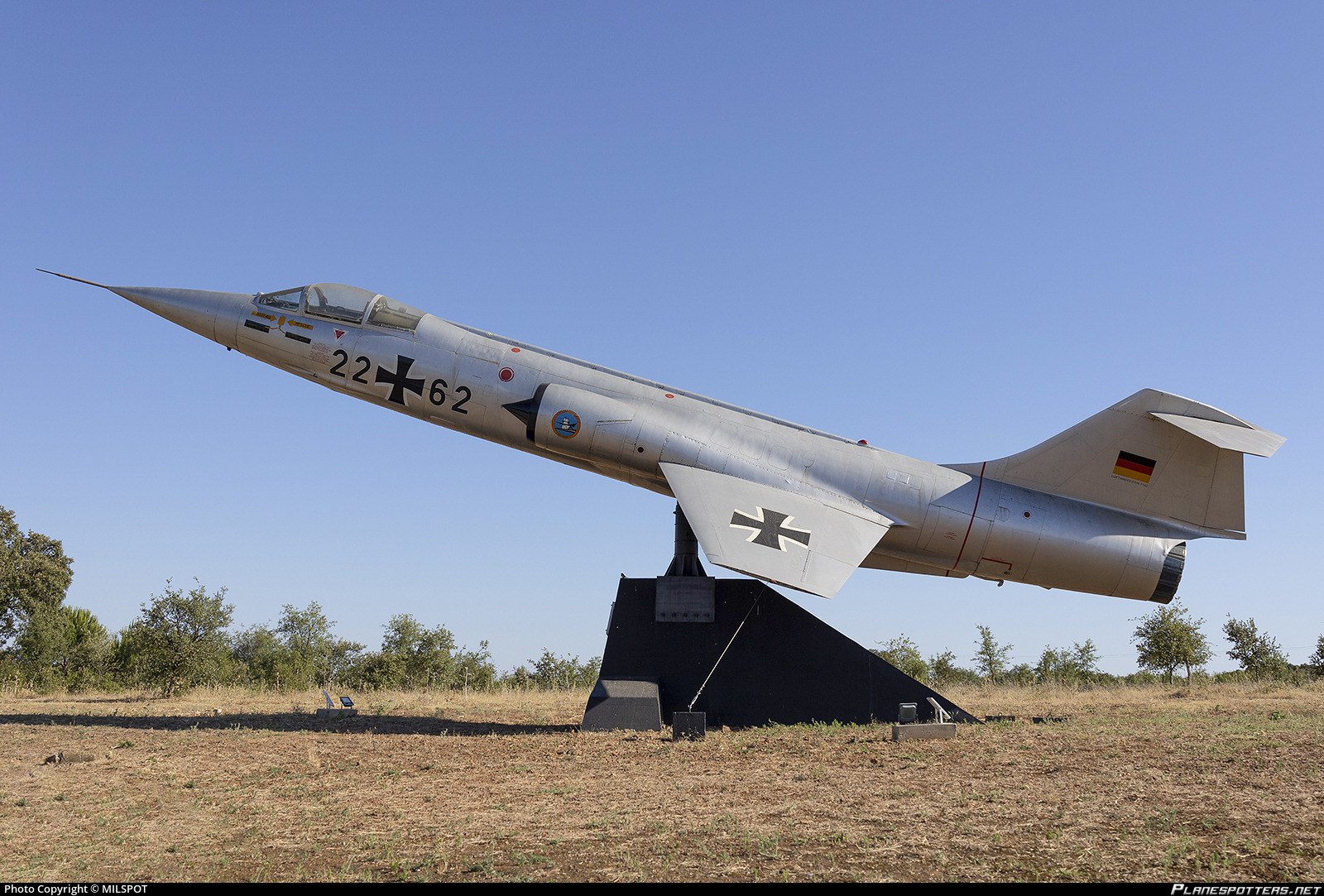 German F-104 Starfighter 22+62 mounted nose-up outdoors.