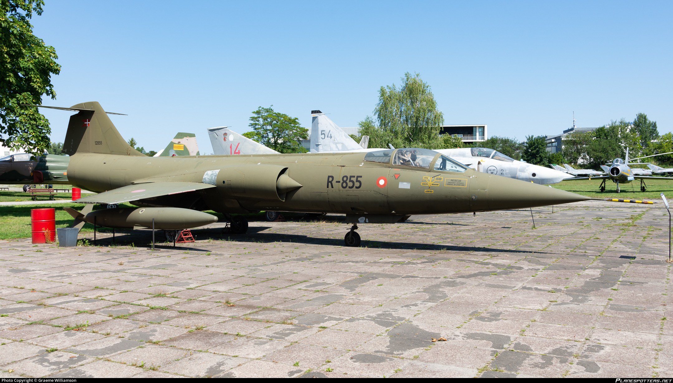 Royal Danish Air Force F-104 Starfighter R-855 displayed outdoors.