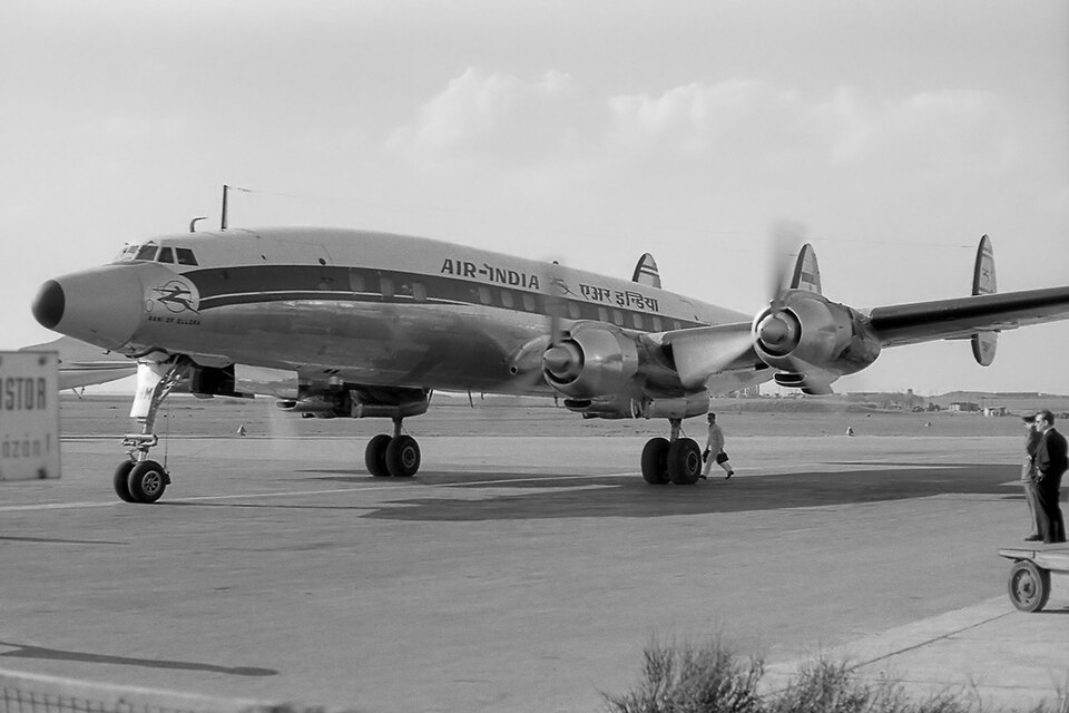 Air India Lockheed L-1049G Super Constellation at Prague Airport, showing the four-engine airliner and triple-tail profile of Lockheed's long-range transport design.
