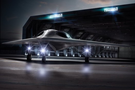 Rendered image of an RQ-170 Sentinel emerging from a lit hangar at night.