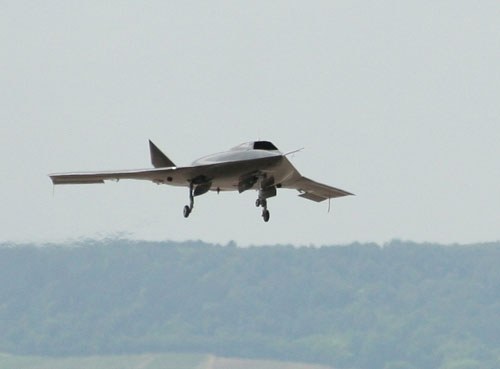 RQ-170 Sentinel approaching a runway with landing gear extended.