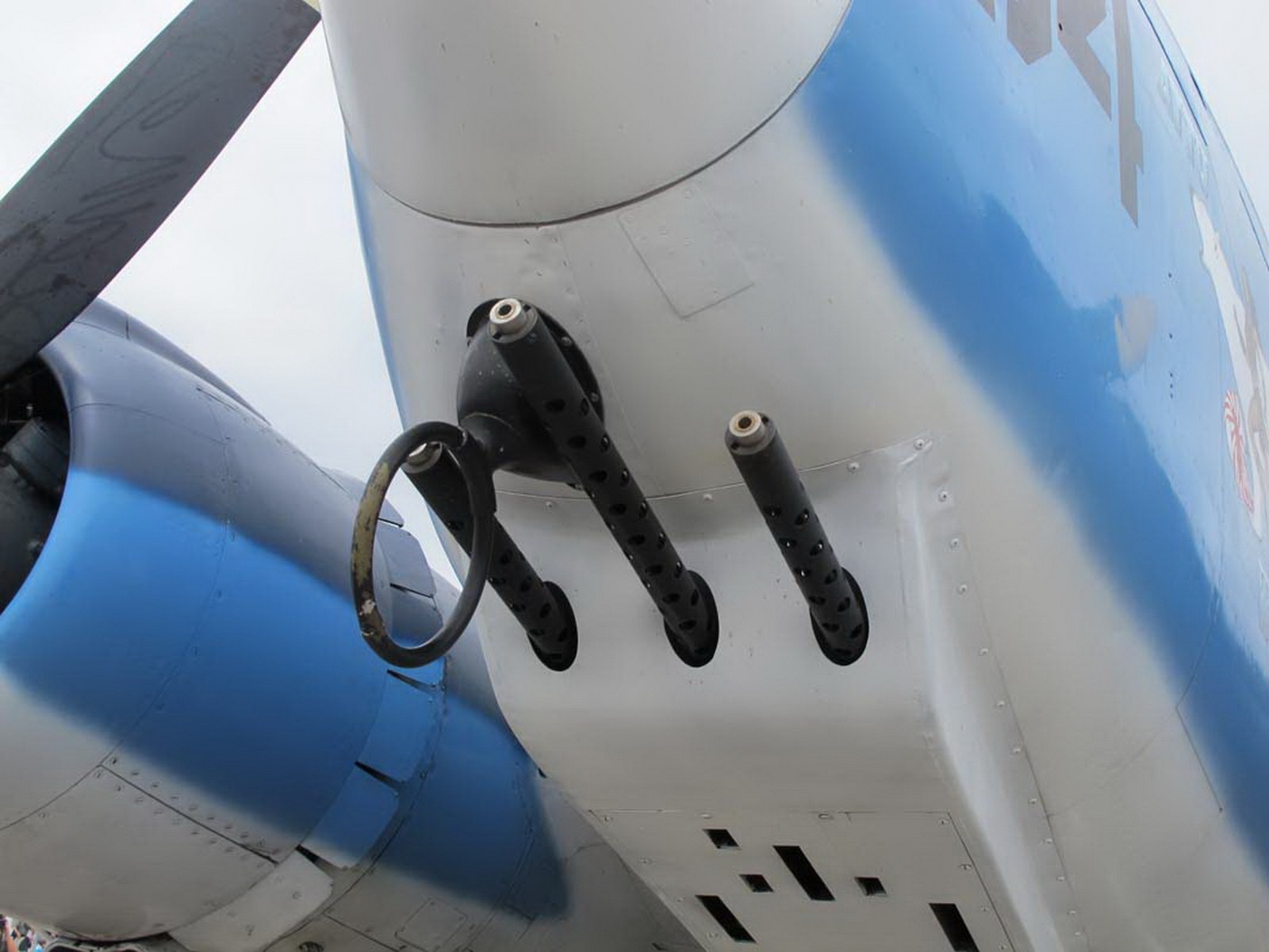 Close-up of PV-2 Harpoon nose guns and blue engine nacelle.