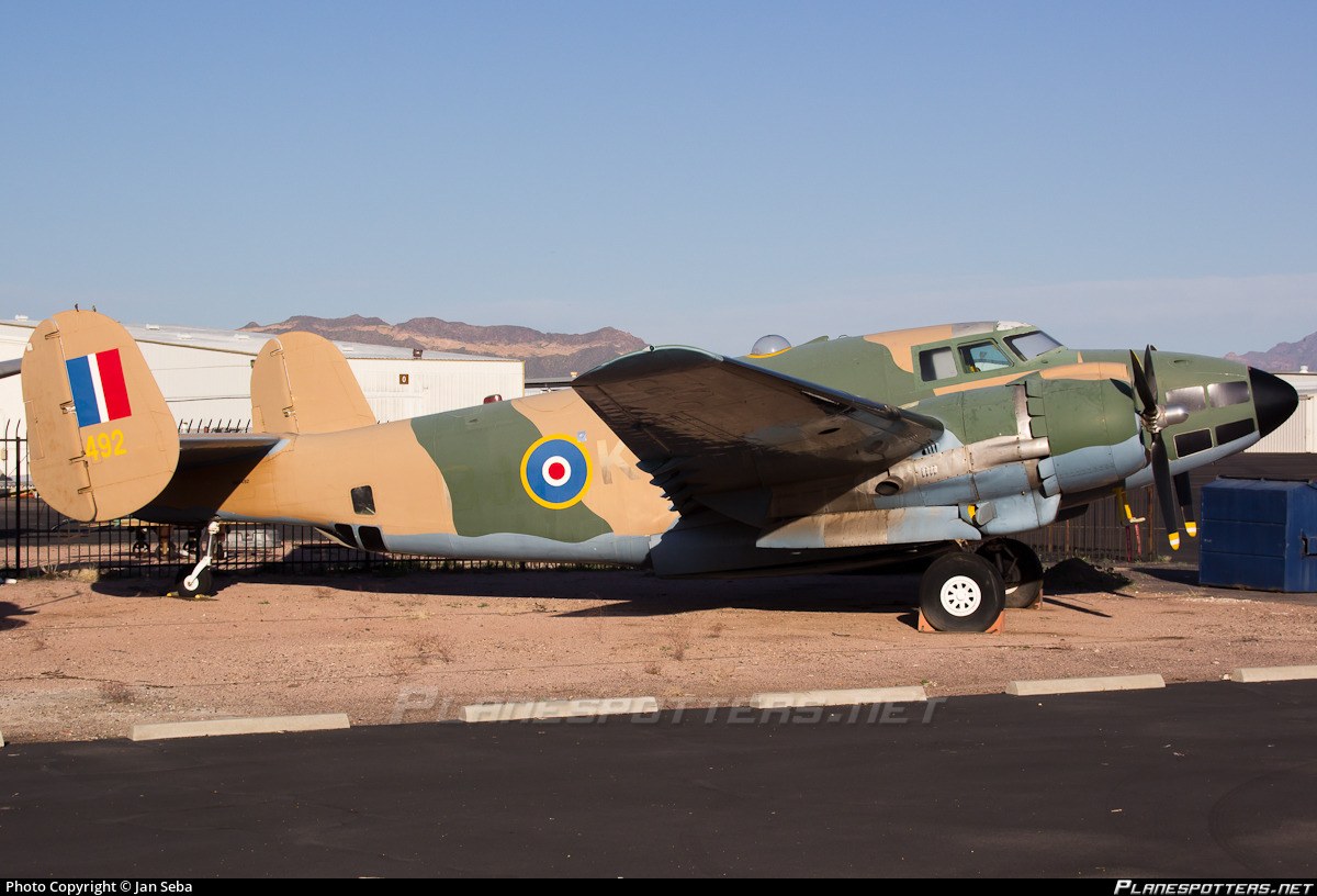 Royal Navy PV-2 Harpoon N86492 displayed outdoors in desert camouflage.