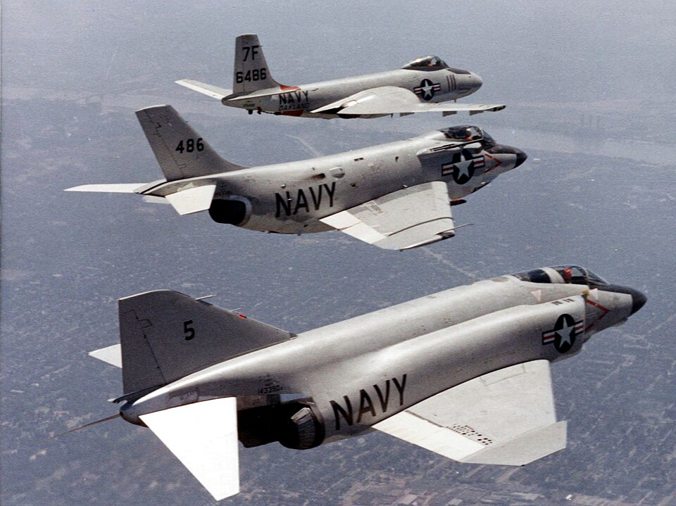 McDonnell F2H, F3H, and F4H fighters flying together, showing predecessor McDonnell aircraft types that later sit within the McDonnell Douglas manufacturer history.