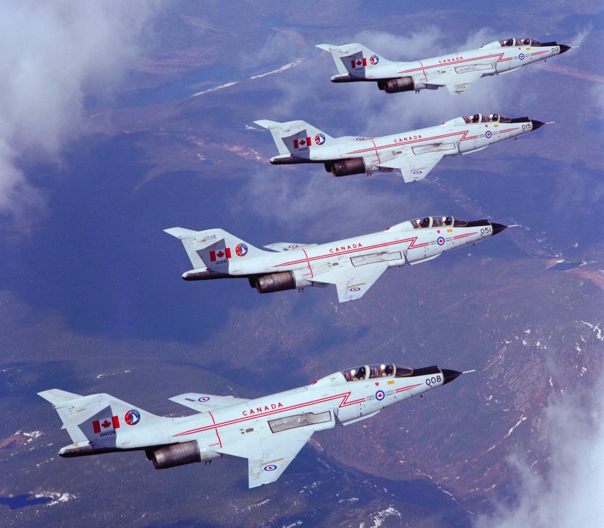 Four Canadian CF-101 Voodoos flying in formation.